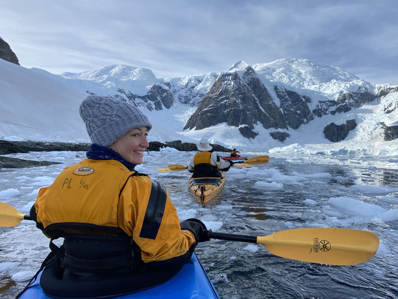 Kayaking through ice in the Antartica